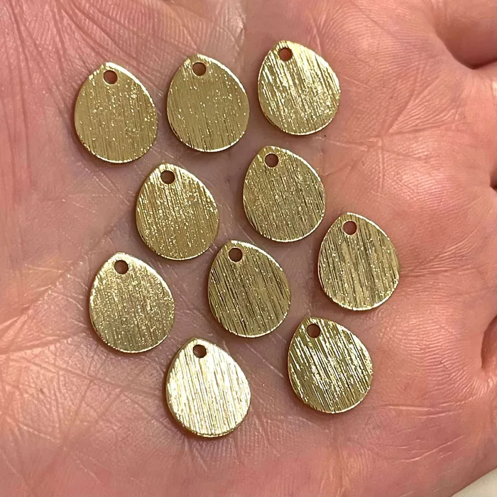 24Kt Gold Plated Brass 12x10mm Drop Charms 10 Pcs in a Pack Peppy Beads Earrings 24Kt Gold Plated Brass 12x10mm Drop Charms 10 Pcs in a Pack Peppy Beads Earrings