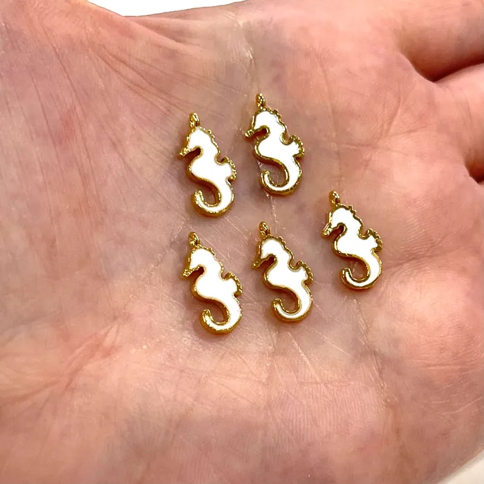 Earrings Peppy Beads 24Kt Gold Plated White Enamelled Sea Horse Charms 5 pcs in a Pack Earrings Peppy Beads 24Kt Gold Plated White Enamelled Sea Horse Charms 5 pcs in a Pack