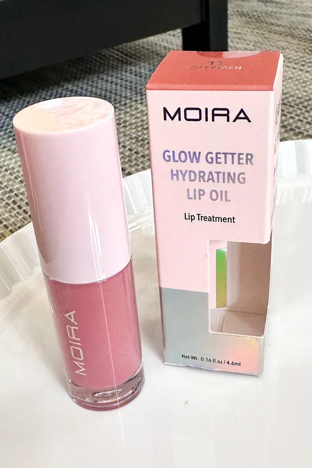 Glow Getter Hydrating Lip Oil Soft Peach Moira Cosmetics Earrings